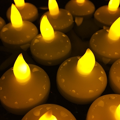 ชุดของ 12 กระพริบ Led แสงเทียน Tealight สีเหลืองกับการเปลี่ยนแบตเตอรี่
